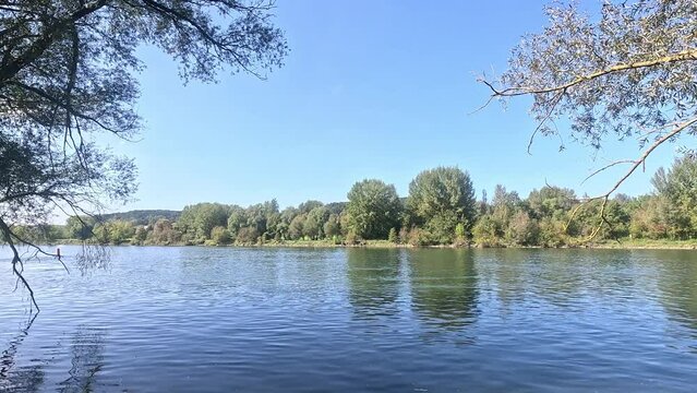 Danube river in autumn with clear clean blue water in sunshine in Bavaria