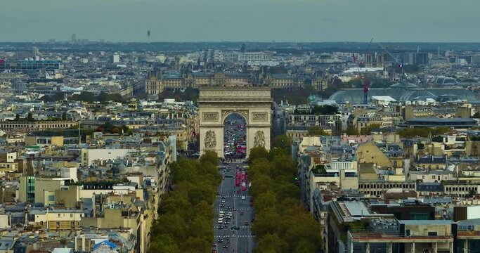 France, Paris Aerial view Triumphal Arch in Champs Elysees with Sacre-Coeur Basilica church in the background. Summer day