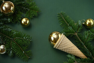 christmas balls decorations in a waffle cones and fir branches