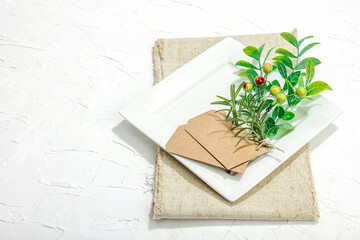 Minimalist table setting. Elegant cutlery, traditional zero waste props. Festive empty dishes