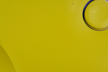 Top view oil bubbles drop on the water with colorful background, Macro photography concept