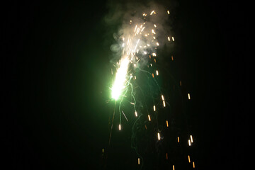 Fireworks in the night sky. New Year and Christmas celebration.