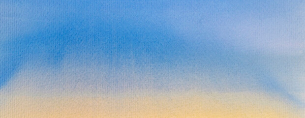 Abstract background painted in watercolor on texture paper, blue and yellow, gradient. morning sky