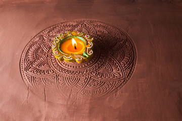 Burning diya on Happy Diwali, background for light festival of India