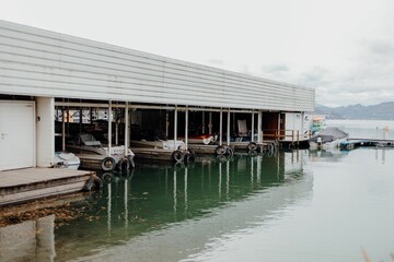Fototapeta na wymiar Boats are moored to a dock in a coastal area