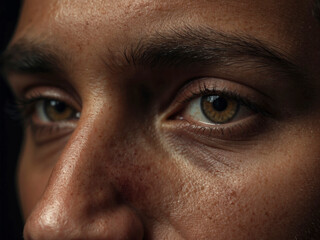 Naklejka premium Closeup portrait of young man against black background. AI Generative