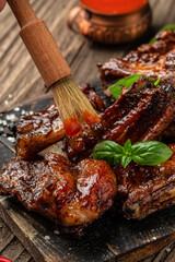 Pork ribs in barbecue sauce. vertical image. top view. copy space for text