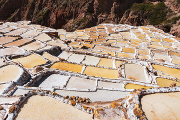 old salt mine terraces in cusco peru 