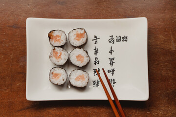salmon maki sushi flat lay