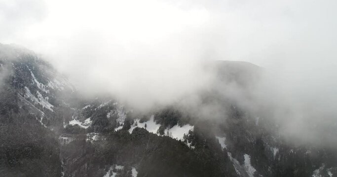 Aerial view of Andorra la Vella, the capital of Andorra, in the Pyrenees mountains between France and Spain. Winter. 