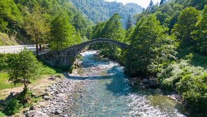 Historical stone bridge. Historical stone bridge built over the river. Shot in Rize Turkey. Firtina...