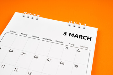 March 2024 month calendar on orange color cover background.