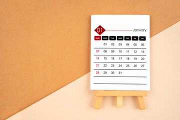 2024 January calendar page on brown background.