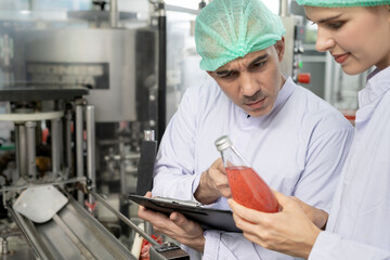quality inspector food or beverages technician inspection about quality control food or beverages before send product to the customer. Production leader recheck ingredient and productivity. - obrazy, fototapety, plakaty