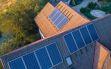 Photovoltaic modules on the roof of a house from different sides