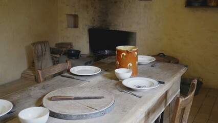 Humble Farmhouse Dining Area with Traditional Wooden Furnishings, Antique Wooden Dining Setup in Rustic Farmhouse Interior