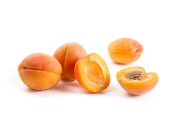 Apricot fruit whole and half isolated on white background..