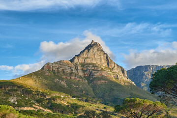 Copyspace landscape view of mountain with lush trees and plants. Beautiful scenic popular natural landmark and tourist attraction for hiking and adventure on Table Mountain in Cape Town, South Africa