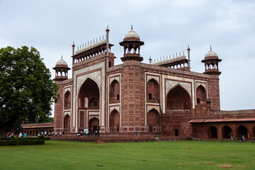 Taj Mahal entrance temple in Agra in India on a cloudy day