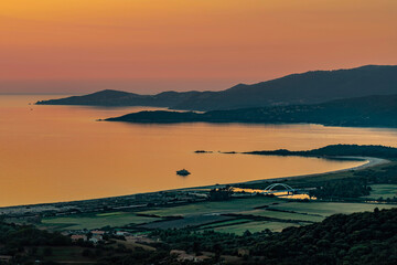 Sunset landscape with Plage du Sagnone, Corsica island, France