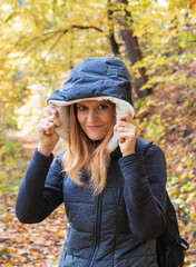 Portrait of beauty young woman in hoodie enjoy autumn season