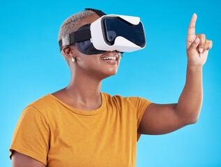 Black woman, metaverse and virtual reality, touch screen with future technology and 3D on blue background. User experience, VR goggles and female person, digital world and gaming software in studio