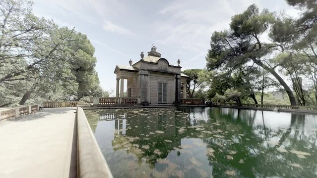 Footage over an old building of Horta Labyrinth Park in Barcelona, Spain