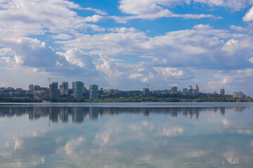 Dnipro is a city at the junction of the center, east and south of Ukraine, the administrative center of the Dnepropetrovsk region. Panoramic view of the right bank of the city