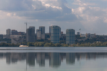 Dnipro is a city at the junction of the center, east and south of Ukraine, the administrative center of the Dnepropetrovsk region. Panoramic view of the right bank of the city