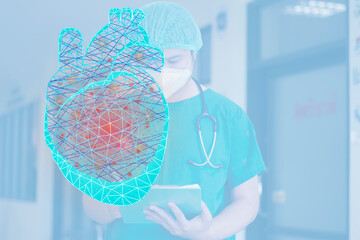 The doctor  look the heart  hologram,  checks the test result on the virtual interface and analyzes...