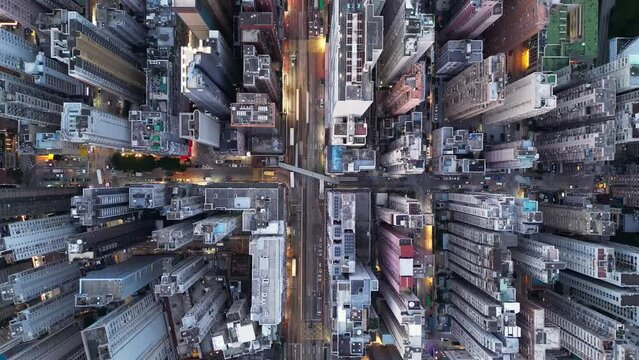 North Point, Hong Kong: Aerial drone footage of the very crowded North Point district in Hong Kong island at night along King's road avenue. 