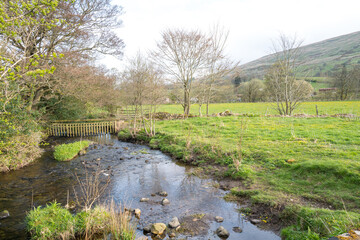 Pretty scene of the pastures in Dentdale by the River Dee