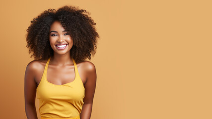 Afro-american woman model wearing a yellow sundress isolated on pastel