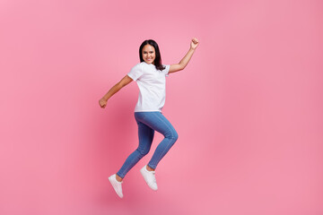 Fototapeta na wymiar Full body size photo of crazy carefree young woman running escape high prices in shopping mall isolated over pink color background