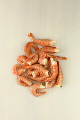 frosted langoustine in box close up photo on white table background