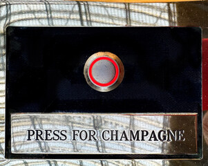in case of emergency press button for champagne