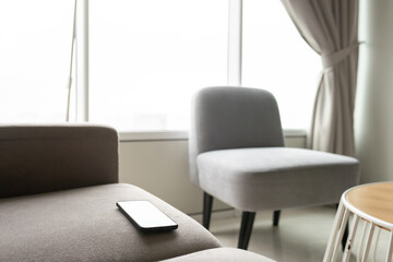 smart phone on the couch in room