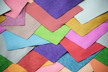 A set of fabric samples in a range of vibrant colors. Square probes. Sewing