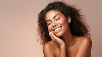 Beautiful smiling young woman with soft glow skin and bare shoulders. - obrazy, fototapety, plakaty