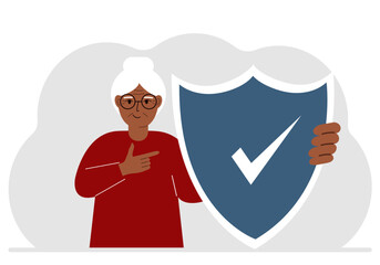 A man holds a shield in his hand, a symbol of insurance. Vector