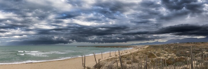 the vermilion coast under a stormy sky