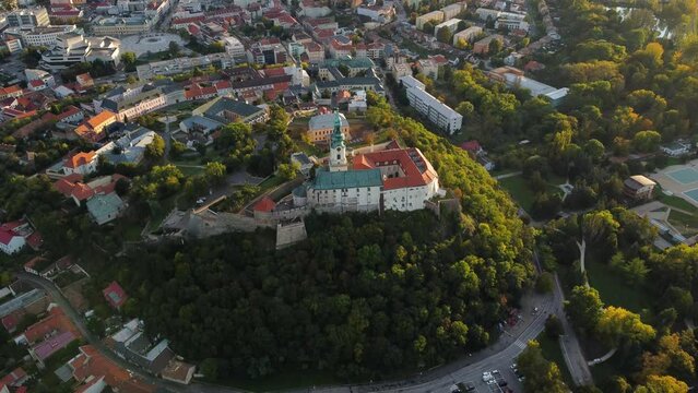 4k footage of Nitra Castle and streets of Nitra city on sunset - autumn time. Aerial view of beautiful and fairytale Nitra Castle.