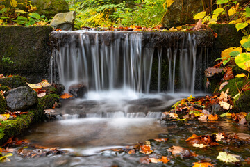 Small cascade in Sauerland Germany from frog perspective with long time exposure. Brook falling...