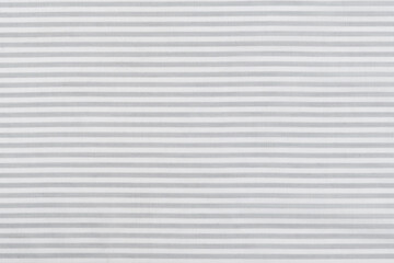 close-up texture of natural cotton calico fabric in gray and white stripes. background for your mockup