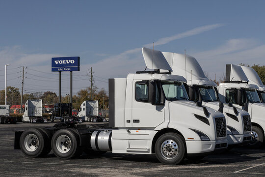 Volvo Semi Tractor Trailer Big Rig Truck display at a dealership. Volvo Trucks supplies complete transport solutions.
