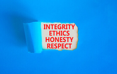 Integrity ethics honesty respect symbol. Concept word Integrity Ethics Honesty Respect on beautiful white paper. Beautiful blue paper background. Business integrity ethics honesty respect concept.