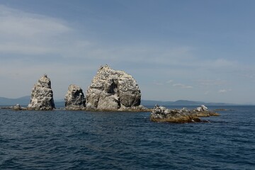 Fototapeta na wymiar The Unkovsky Stones Islands in Peter the Great Bay of the Sea of Japan