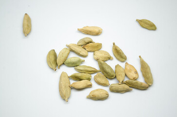Cardamom seeds isolated on white background. Cardamom is a spice used in cooking