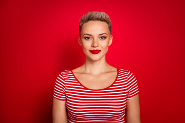 Portrait of lady white short haircut wearing striped stylish t shirt looks confident with bright...