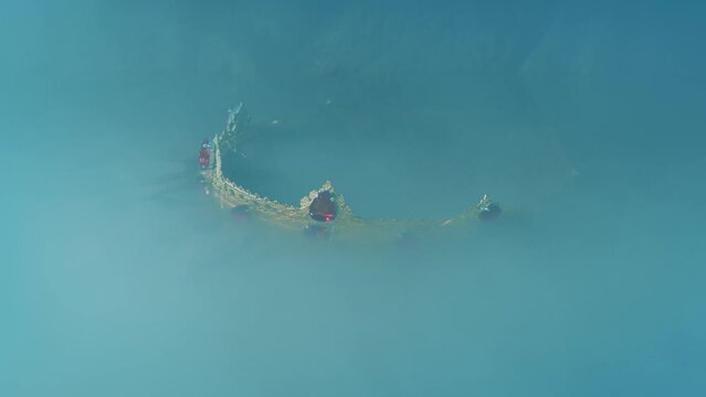 Fantasy Scene Of Submerged Crown Revealed In Misty Cave